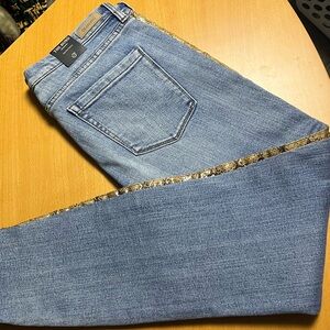 NWT jeans with faux leather snakeskin detail